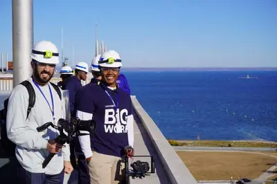 Video production crew on location with gimbal rigs