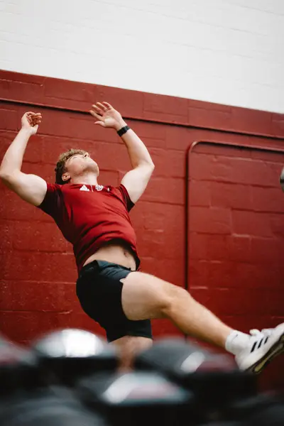 UMass Athletics strength and conditioning — athlete training in the weight room, Amherst MA