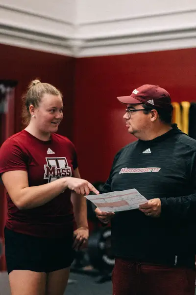 UMass Athletics strength and conditioning — athlete training in the weight room, Amherst MA