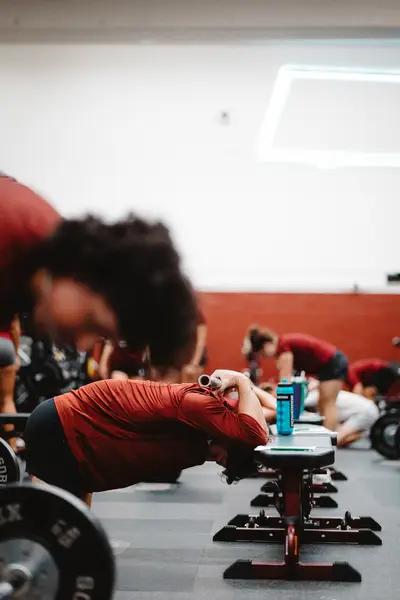 UMass Athletics strength and conditioning — athlete training in the weight room, Amherst MA
