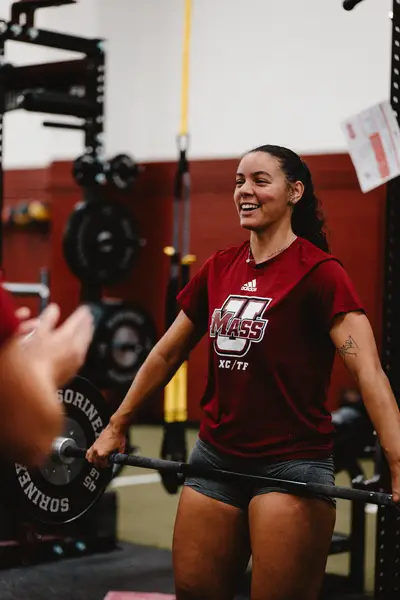 UMass Athletics strength and conditioning — athlete training in the weight room, Amherst MA