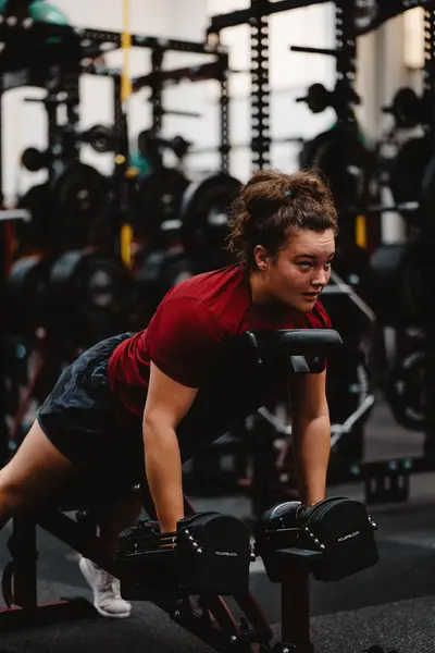 UMass Athletics strength and conditioning — athlete training in the weight room, Amherst MA